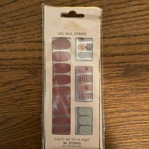 Joyce gel nail strip. New in package . Neutral with hearts and glitter